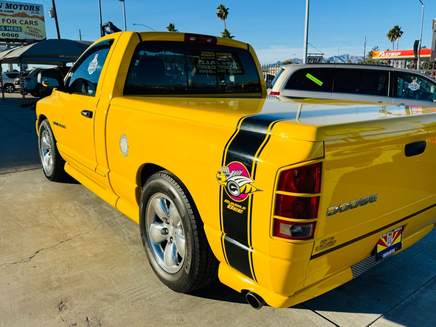 2004 Yellow /black Dodge Ram 1500 (1D7HA16D54J) , located at 2190 Hwy 95, Bullhead City, AZ, 86442, (928) 704-0060, 0.000000, 0.000000 - 2004 Dodge Ram SLT Bumblebee edition. Bright yellow with a black leather interior with yellow trim. This limited Bumblebee edition truck will sure turn heads. Hemi engine. 20 in wheels . *1 owner. matching tonneau cover. In excellent shape. 2004 Dodge Ram 1500 Rumble Bee. It is a limited edition tru - Photo#5